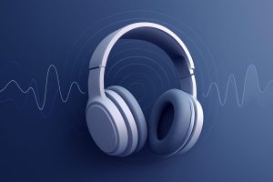 Sleek modern headphones on a wooden table with a soft background blur