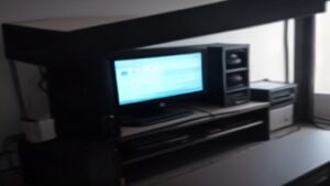 Modern workstation displaying comparative performance benchmarks for six advanced computing platforms