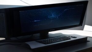 Three premium handheld gaming PCs, Steam Deck 2, ROG Ally X 2, and Lenovo Legion Go 2, displayed on a clean white surface with subtle shadows