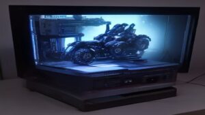 Four premium 4K OLED monitors arranged in a sleek display array with precision calibration tools visible