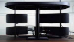 A sleek modern dashboard displaying benchmark charts and data visualizations on a high-resolution screen